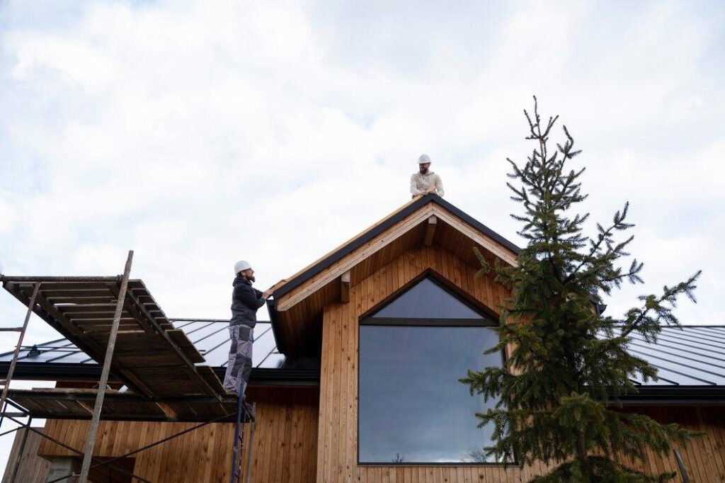 A technician cleaning a roof